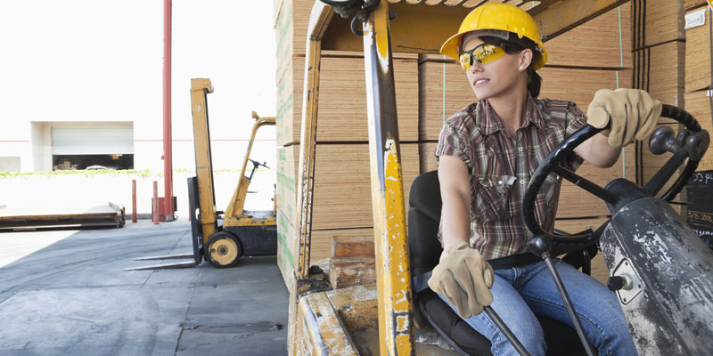Business-is-GREAT-Woman-operating-fork-lift-truck