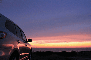 Car overlooking sunset