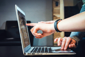 People working together on a laptop