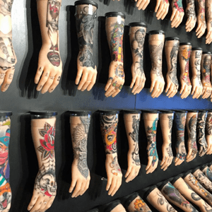 Prosthetic arms with tattoo designs