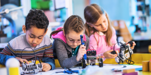 Children working on a robotics lesson